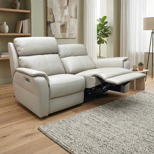 Living room view for the Nicoletti Vito 2-seater, highlighting the triple-power functionality: power recline, power headrests, and power lumbar support.