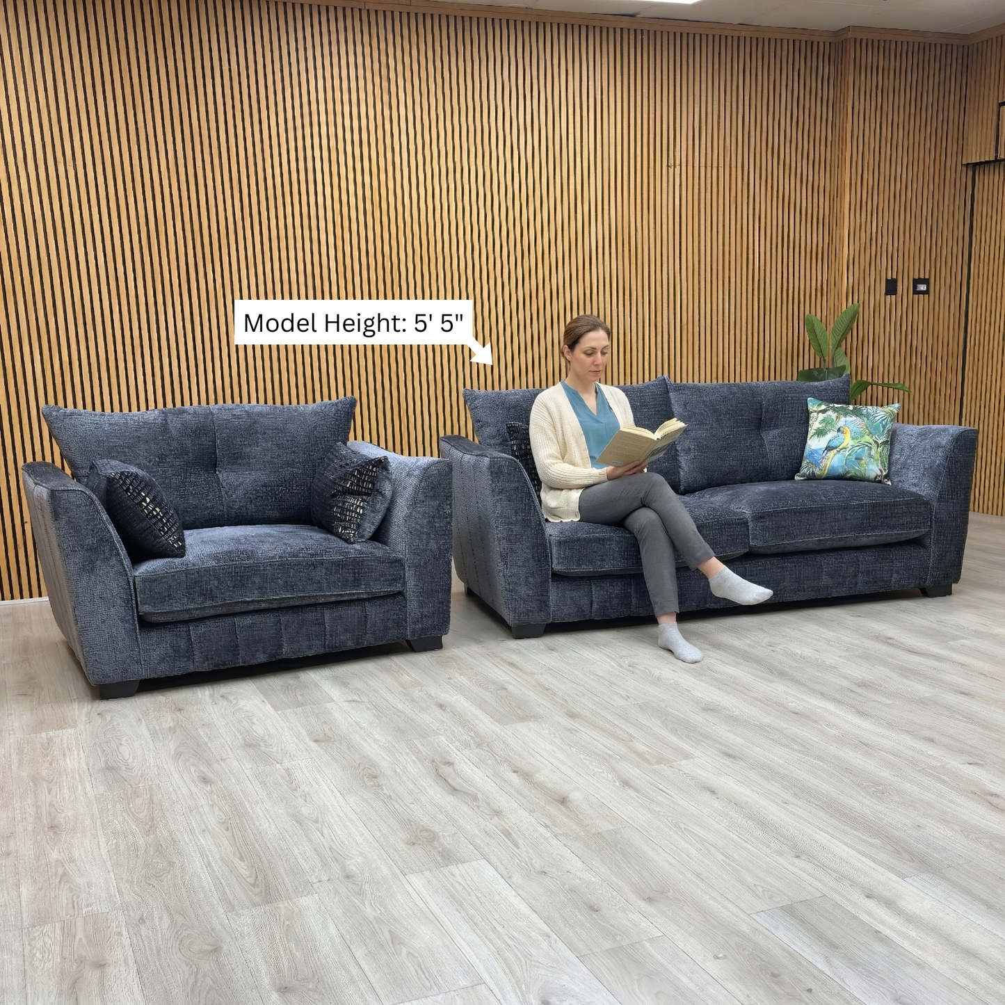Lifestyle view of the matching Allure snuggler chair, showcasing its spacious 1.5-seater design and comfortable deep-cushioned seating.