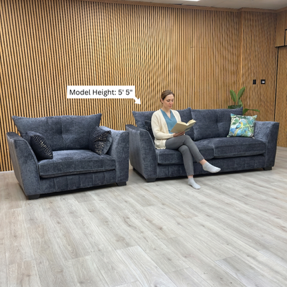 Lifestyle view of the matching Allure snuggler chair, showcasing its spacious 1.5-seater design and comfortable deep-cushioned seating.
