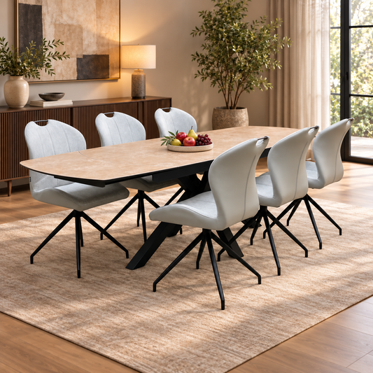 Raul ceramic top dining table and six stone grey swivel chairs in a dining room with a fruit bowl and sideboard