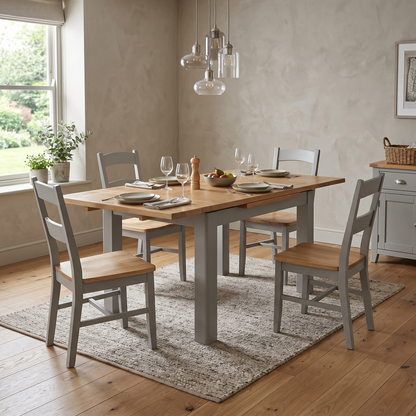Dining room view for the Lewis solid oak dining table, highlighting the traditional draw-leaf extension mechanism and premium oak construction.