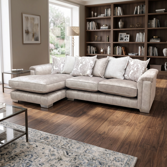 Living room of the oatmeal Dolcie chaise sofa, highlighting the relaxed pillow back design and the left-hand oriented chaise.