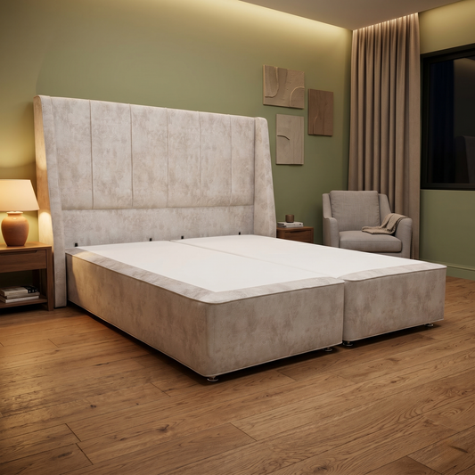 Bed room of the Longwick Super King bed in a modern bedroom setting, highlighting the elegant stone velvet texture and high headboard.