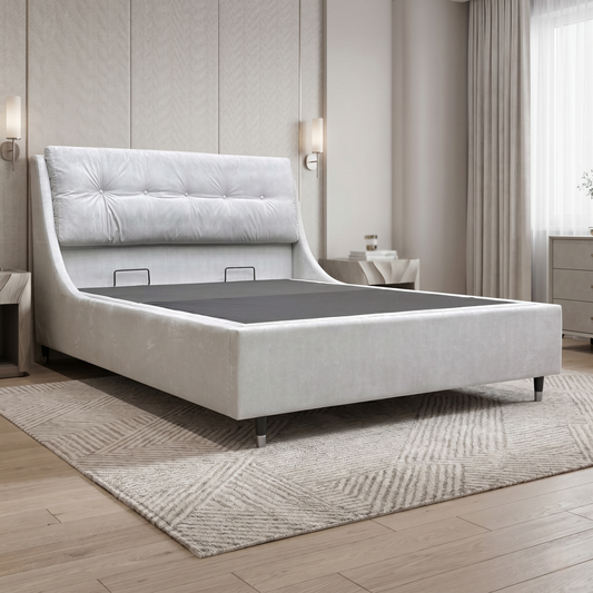Bedroom view for the Javier ottoman bed, highlighting the gas-lift hydraulic mechanism and the expansive storage area beneath the slats.