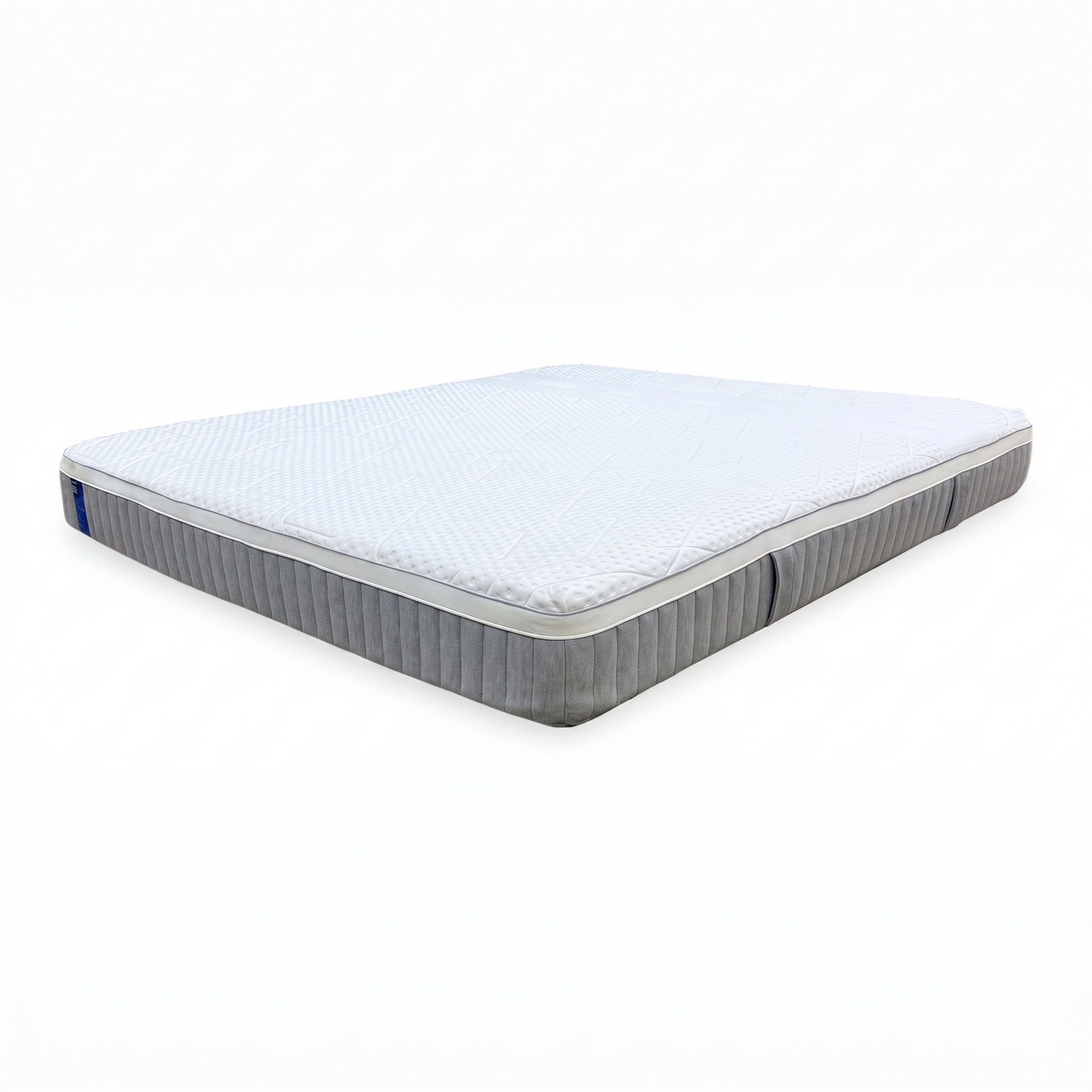 Full View ‘Emma Smart Hybrid Deluxe’ Super King size mattress, showcasing a modern breathable quilted sleep surface with a contrasting grey fabric base profile.