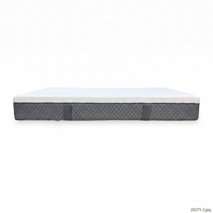 Side perspective profile view of the mattress edge, highlighting the contrasting grey border panel and the heavy-duty X-shaped reinforcement stitching engineered for shape retention.