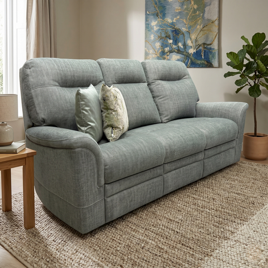 Living room view for the Parker Knoll ‘Hudson 23’ 3-seater sofa, highlighting its premium Sierra Conifer Green fabric upholstery, medium comfort level, and high-quality British craftsmanship.