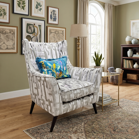 Lifestyle view for the Boutique ‘Allure’ wing chair, highlighting its unique Iron-toned patterned fabric upholstery, exceptional support, and medium comfort level.