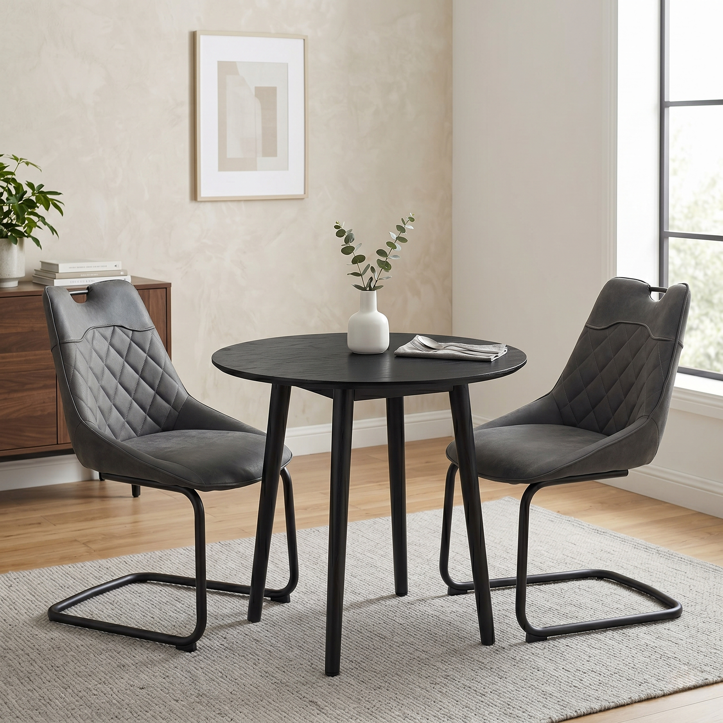 Dining room view for the ‘Warrior’ Charcoal Grey fabric cantilever dining chairs, highlighting the pair configuration, premium textured upholstery, and smooth gentle bounce motion.