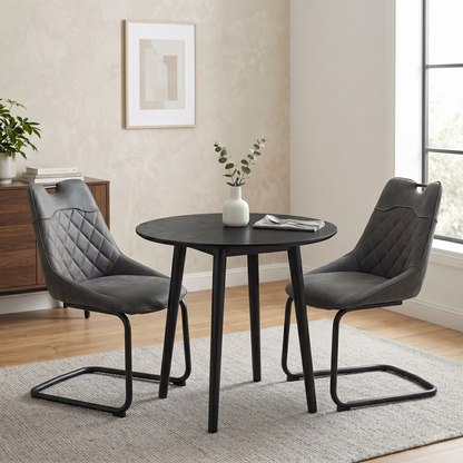 Dining room view for the ‘Warrior’ Charcoal Grey fabric cantilever dining chairs, highlighting the pair configuration, premium textured upholstery, and smooth gentle bounce motion.