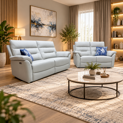 Sally light grey leather 3 and 2 seater sofas in a living room with a round marble coffee table