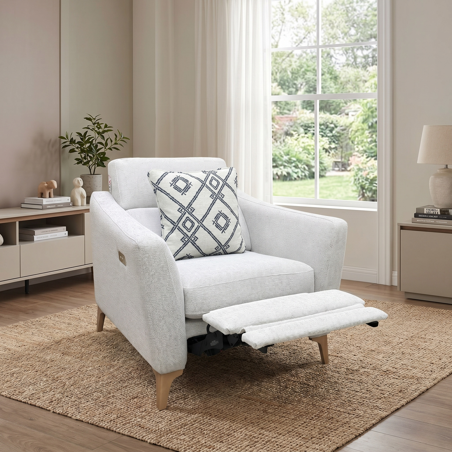 Living room view of the Moderna pearl grey fabric power reclining chair fully extended, showcasing the electric footrest and smooth motorized mechanism for customized lounge comfort.