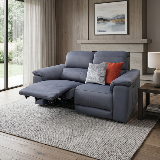 Living room of the Genius iron grey fabric 2-seater sofa fully reclined with power headrests tilted forward, demonstrating independent electronic controls for customized lounging comfort.