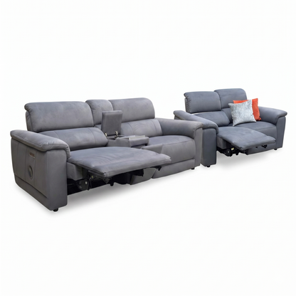 Gray reclining sofa set with additional seat on a white background