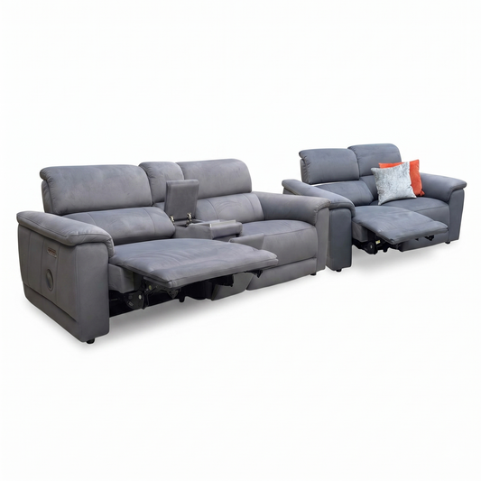 Gray reclining sofa set with additional seat on a white background