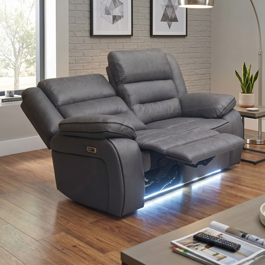 Living room view of Vegas charcoal grey fabric home theatre 2-seater sofa. Detailed shot highlighting the deeply padded backrests, ergonomic arm cushions, and heavy-duty reclining base frame engineered for premium lounging comfort.