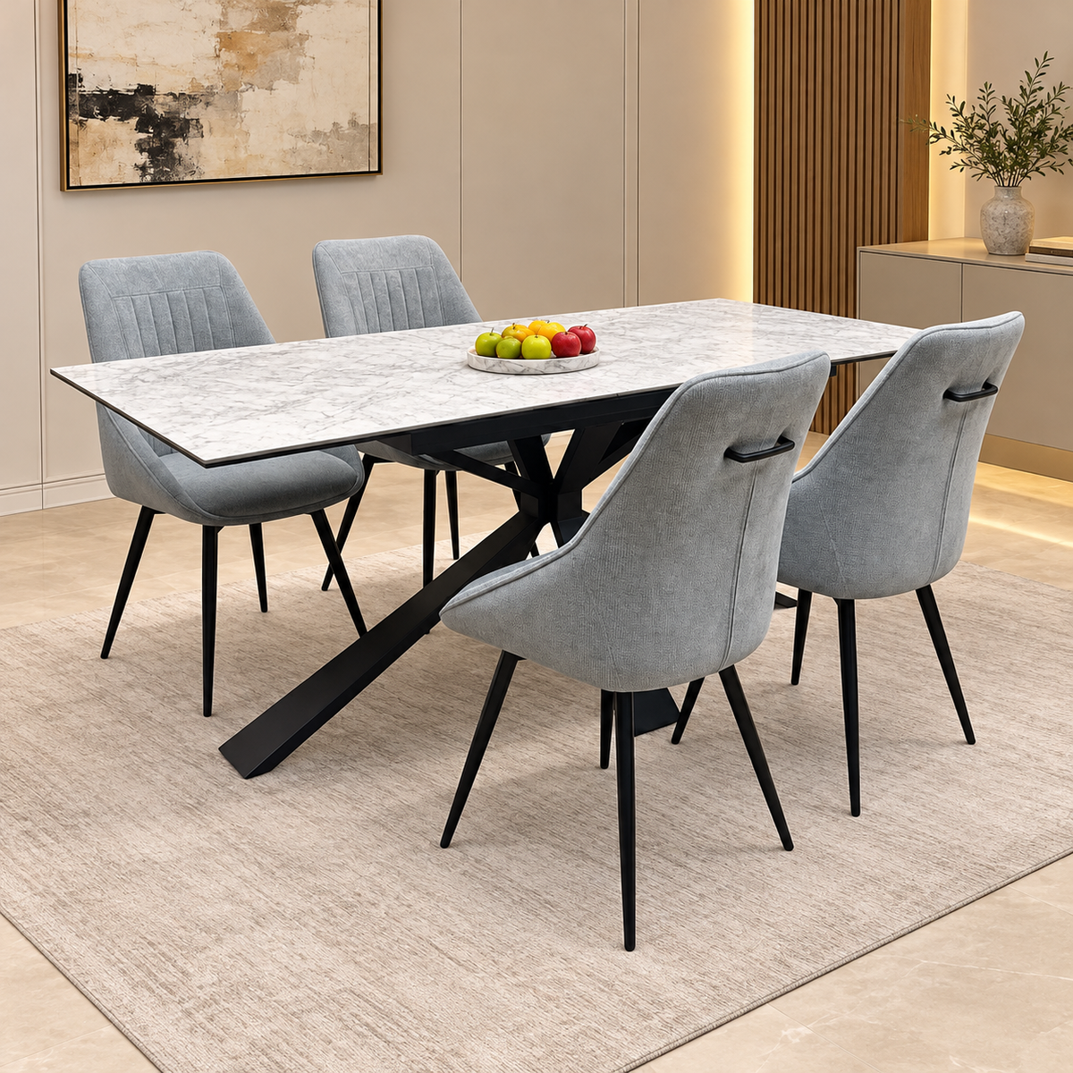 Crete ceramic top dining table and four dark grey swivel chairs in a dining room with a fruit bowl on top