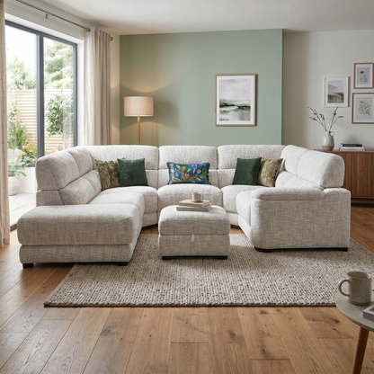 Styled modern apartment living room lifestyle layout featuring the Nova beige fabric corner chaise sofa and storage footstool arranged as an inviting central centerpiece.