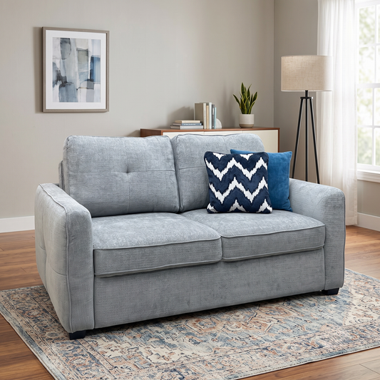 ‘Karen’ Grey Fabric 2 Seater Sofa Bed, styled in a lifestyle room setting