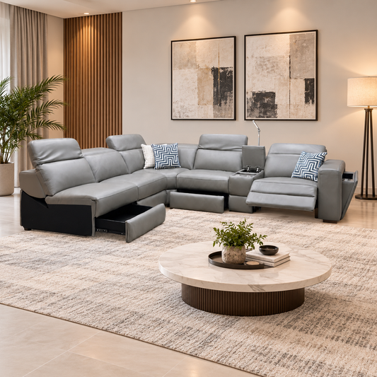 Ankara mushroom grey leather corner sofa in a living room with a round marble coffee table and rug