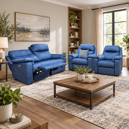 G Plan Thornbury indigo velvet 3 seater recliner sofa and two chairs in a living room with a rustic wooden coffee table