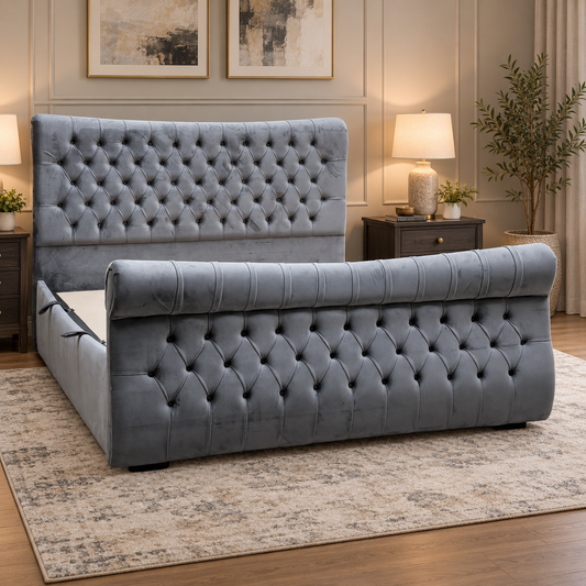 Lance dark grey velvet ottoman bed frame in a bedroom with bedside lamps and a patterned rug