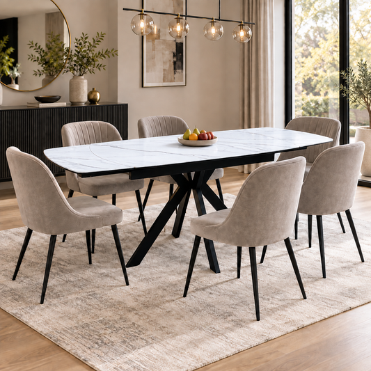 Quattro oyster ceramic top extending dining table with six beige dining chairs in a dining room