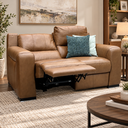Marinelli Viali bark brown leather 2 seater recliner sofa reclined in a living room with a rug and round coffee table