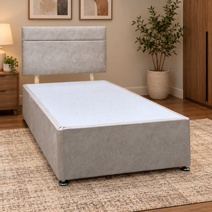 Alfie beige velvet single divan base and headboard in a bedroom beside a wooden bedside table