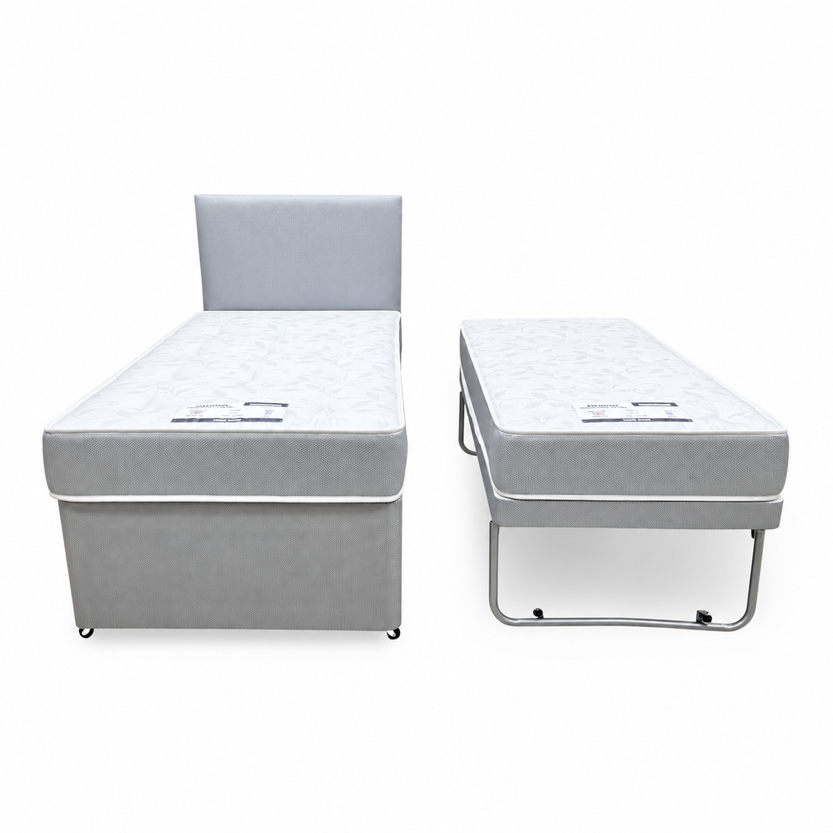 Front view of the Gus grey fabric single guest bed next to the pull-out bed raised on its folding legs