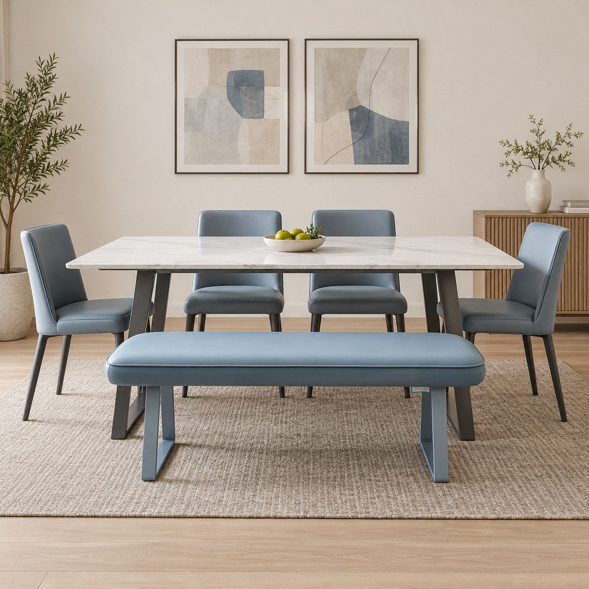 Fumo light grey faux leather dining bench at a white marble-effect dining table with four matching chairs