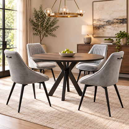 Four Crete light grey fabric dining chairs around a round dark wooden table in a dining room with a brass light