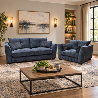 Allure indigo fabric 3 seater sofa and snuggler chair in a living room with a wooden coffee table and rug