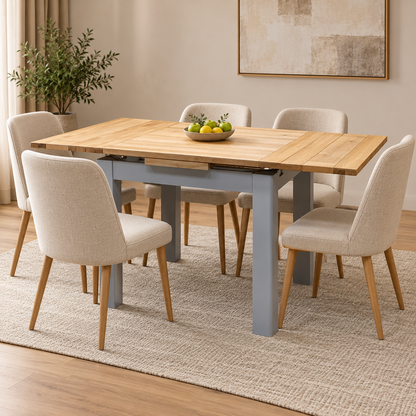 Lewis oak and grey draw leaf dining table in a bright dining room