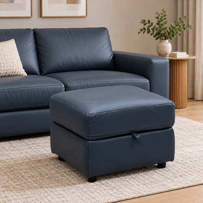 World of Leather Touch ocean blue leather storage footstool in a living room beside a matching blue sofa
