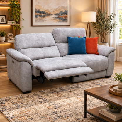 Saffron grey velvet large 3 seater power recliner sofa reclined in a living room with a mountain print and patterned rug