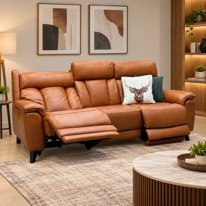 Dreamer saddle brown leather 3 seater power recliner sofa in a living room with a marble top coffee table