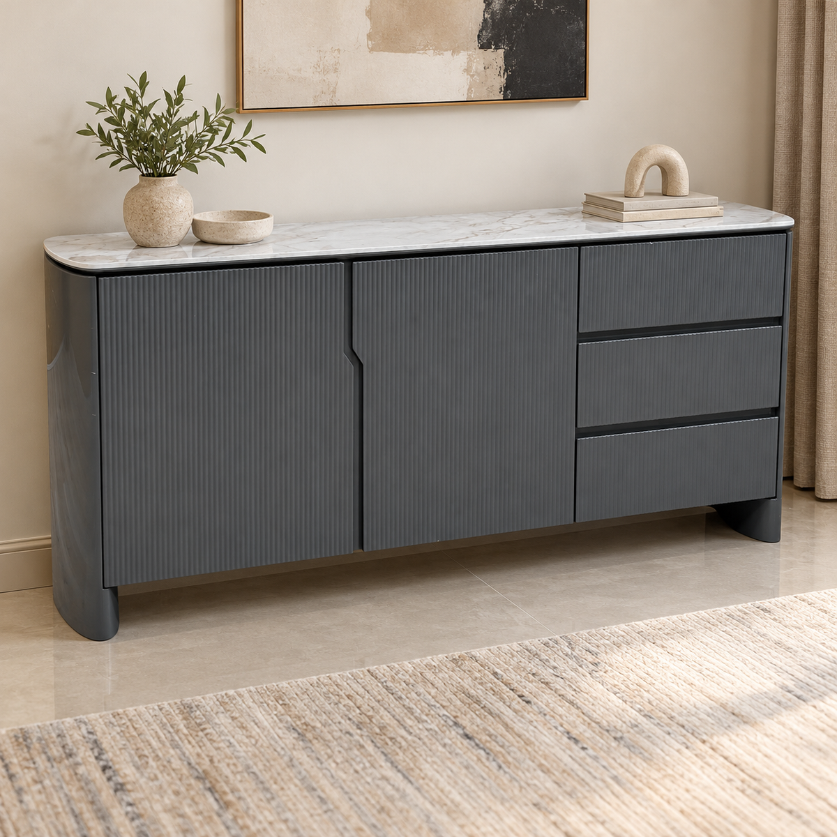 Ivy grey high gloss 2 door 3 drawer sideboard in a neutral room with a vase, abstract artwork and woven rug