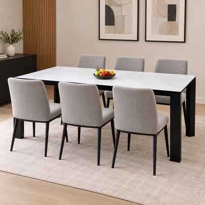 Connubia Viola light grey ceramic top 220cm dining table in a room scene with six grey fabric chairs