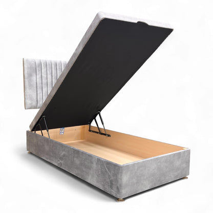 Side profile of the single ottoman bed, emphasizing the stability of the floor-standing headboard and the clean lines of the velvet base.
