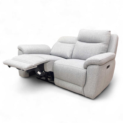 Wide frontal shot of the ‘Bobby’ Florence power recliner in stone grey fabric, highlighting the symmetrical 2-seater design.
