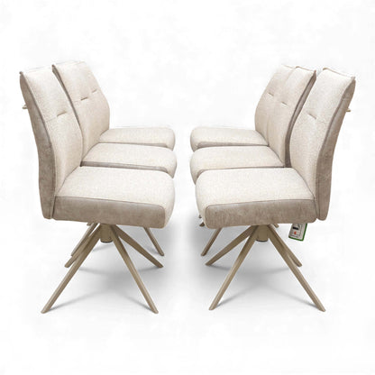 Side view of the six Mirage neutral fabric swivel dining chairs lined up in two rows of three