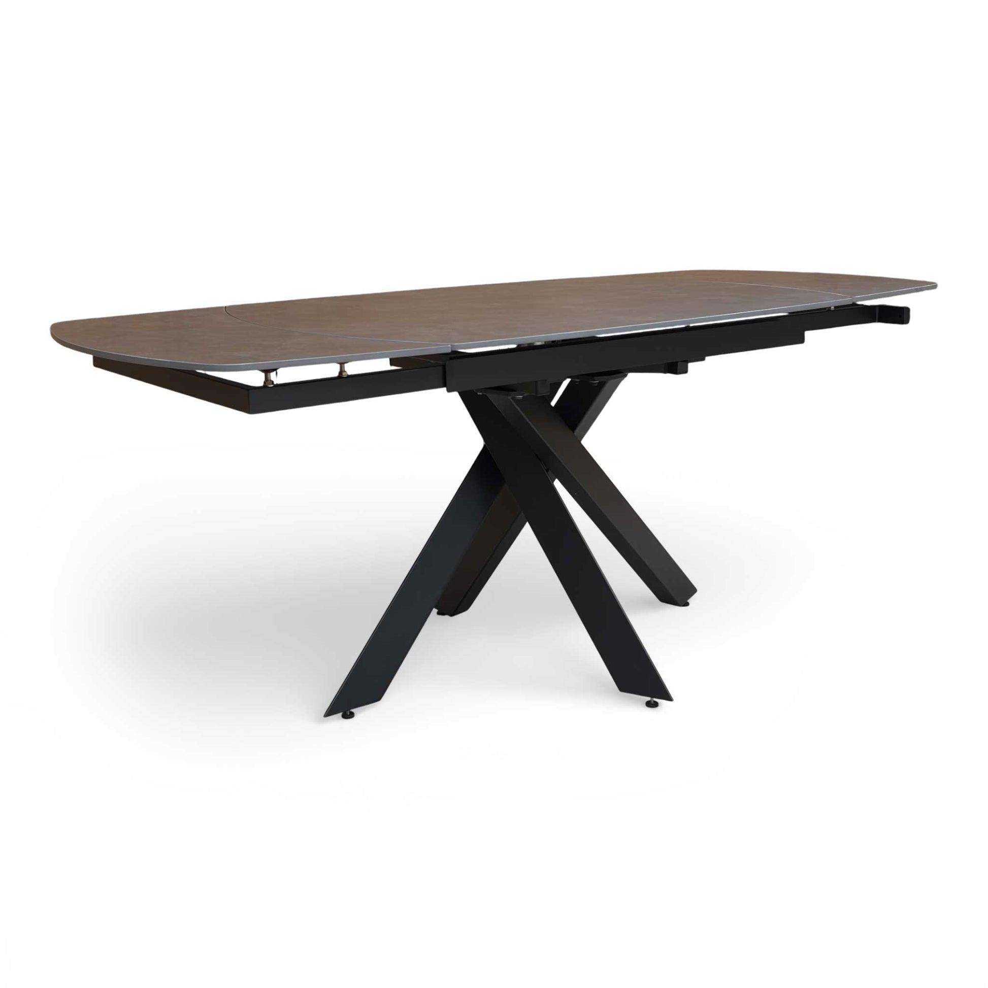 Full view of the ‘Warrior’ Grey Sintered Stone Swivel Extending Dining Table in its closed position.