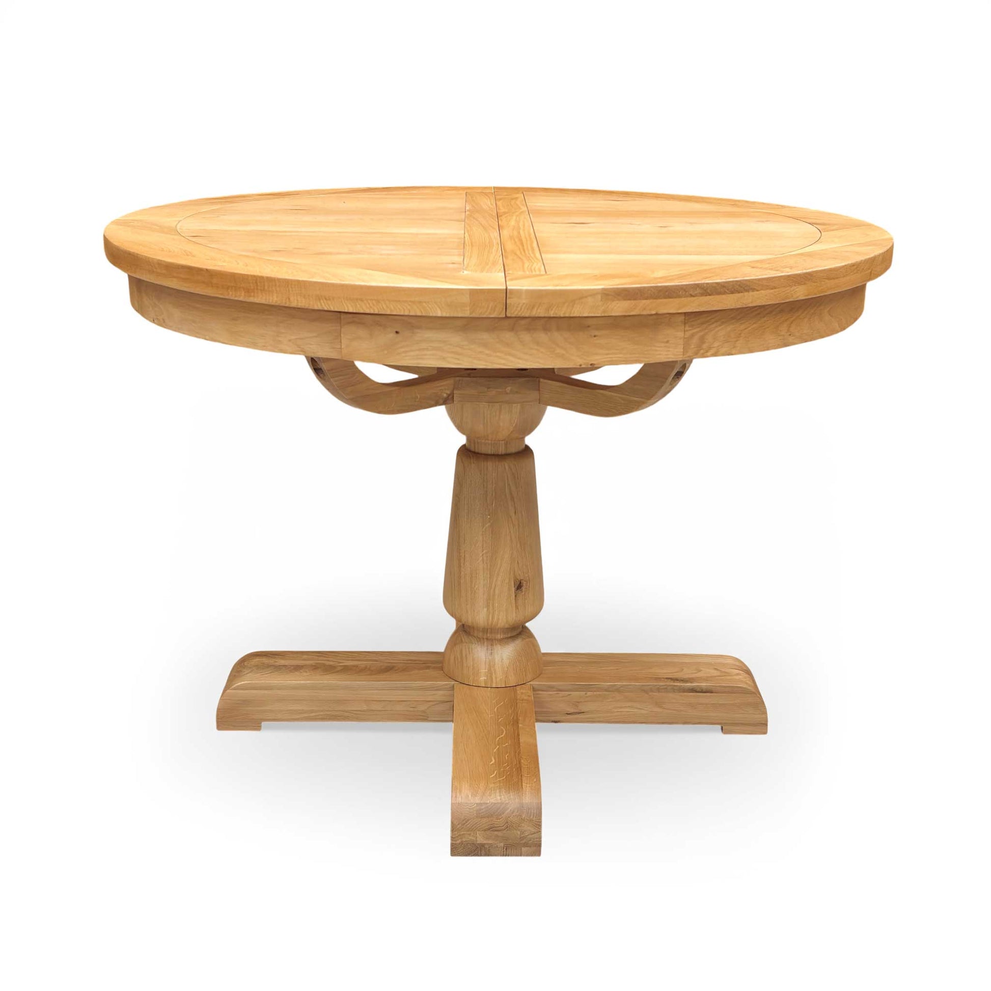 Side view of the Augusta dining table's central pedestal leg structure, showcasing the craftsmanship, stability, and elegant turned wood design.