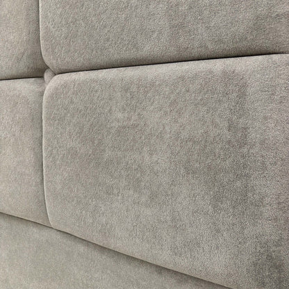 Close-up of the Milan floor-standing headboard, showing the sophisticated nickel fabric texture and high-quality craftsmanship.