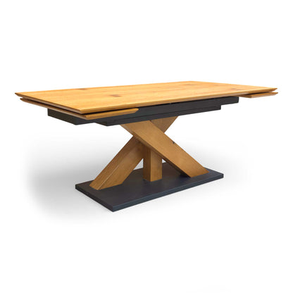 Side shot of the oak veneer table top, emphasizing the unique natural marks, knots, and warm texture of the wood.