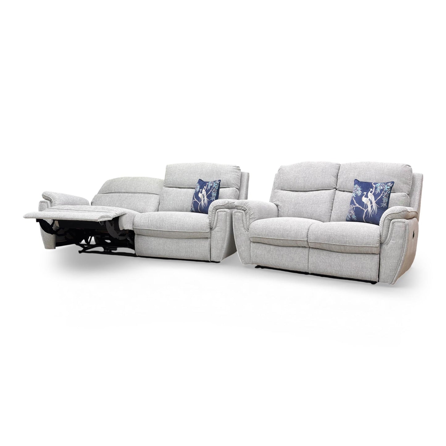 Side profile of the Ashton sofa, showcasing the recliner in action and the distinctive chrome insert that defines the collection's style.
