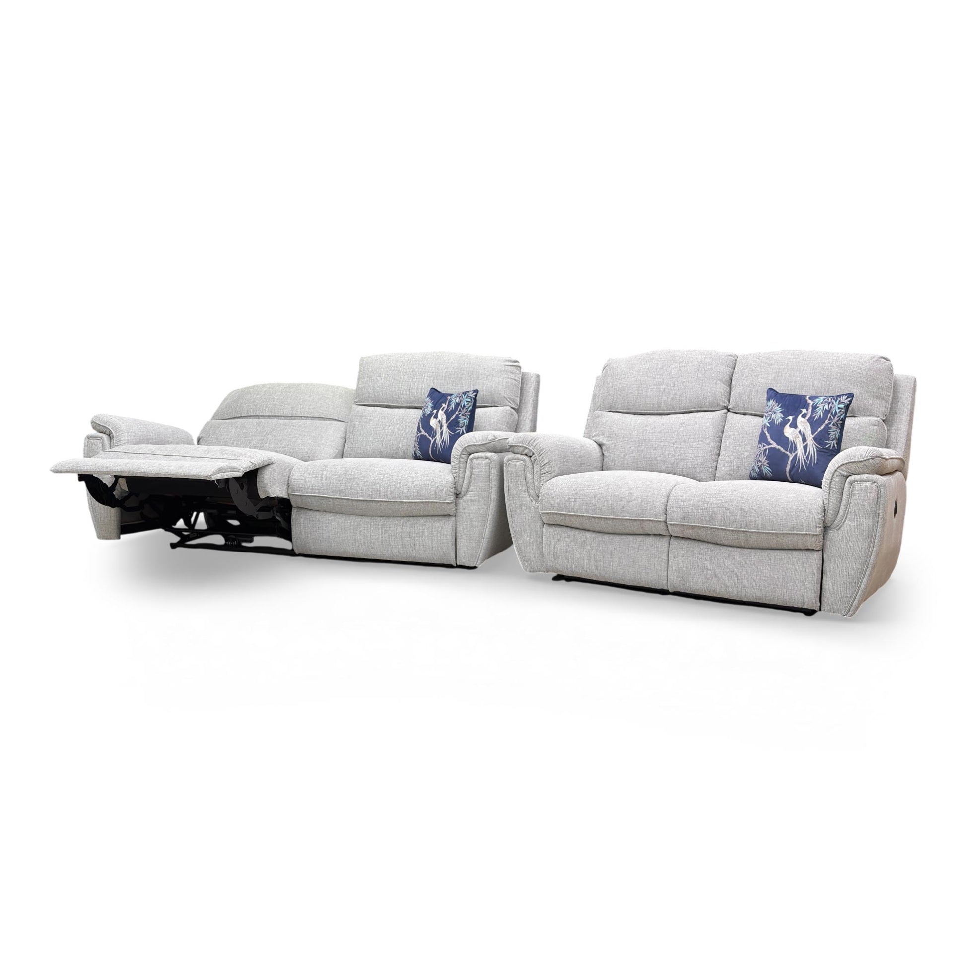 Side profile of the Ashton sofa, showcasing the recliner in action and the distinctive chrome insert that defines the collection's style.