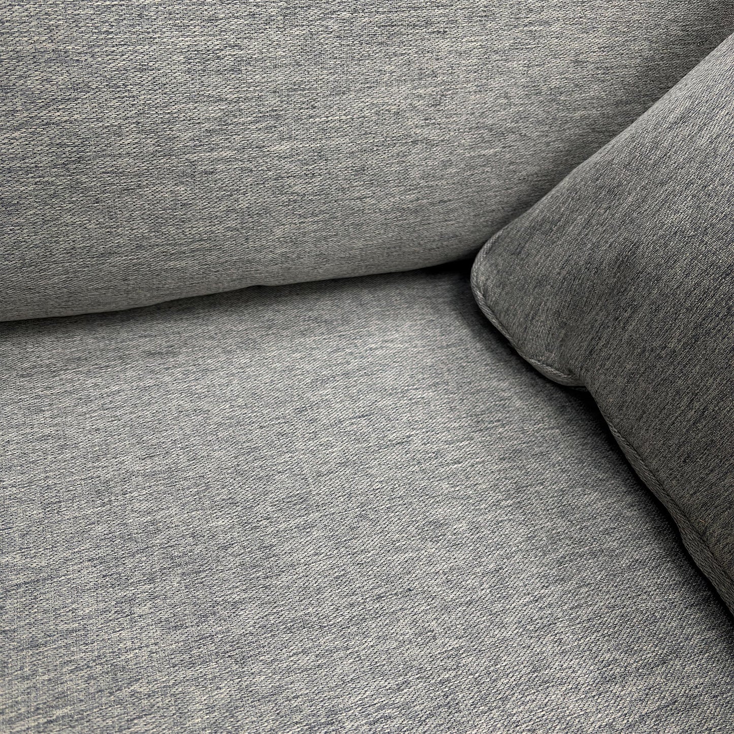 Close-up view of the Chalfont 2-seater sofa in Novak Grey, emphasizing its compact yet spacious seating and modern living room aesthetic.