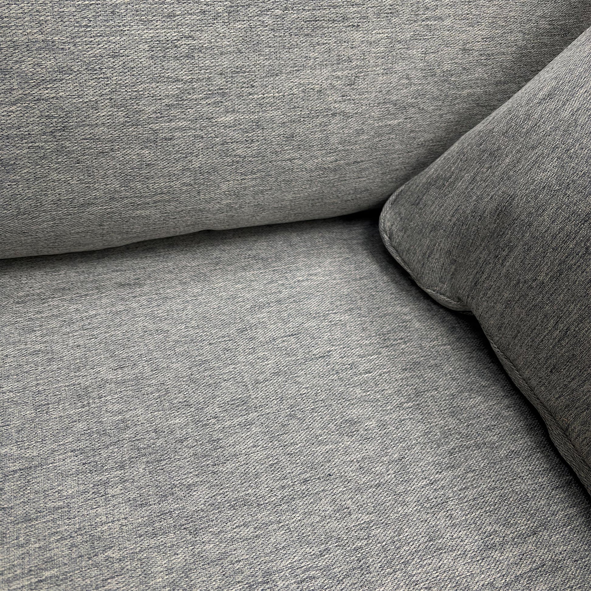 Close-up view of the Chalfont 2-seater sofa in Novak Grey, emphasizing its compact yet spacious seating and modern living room aesthetic.